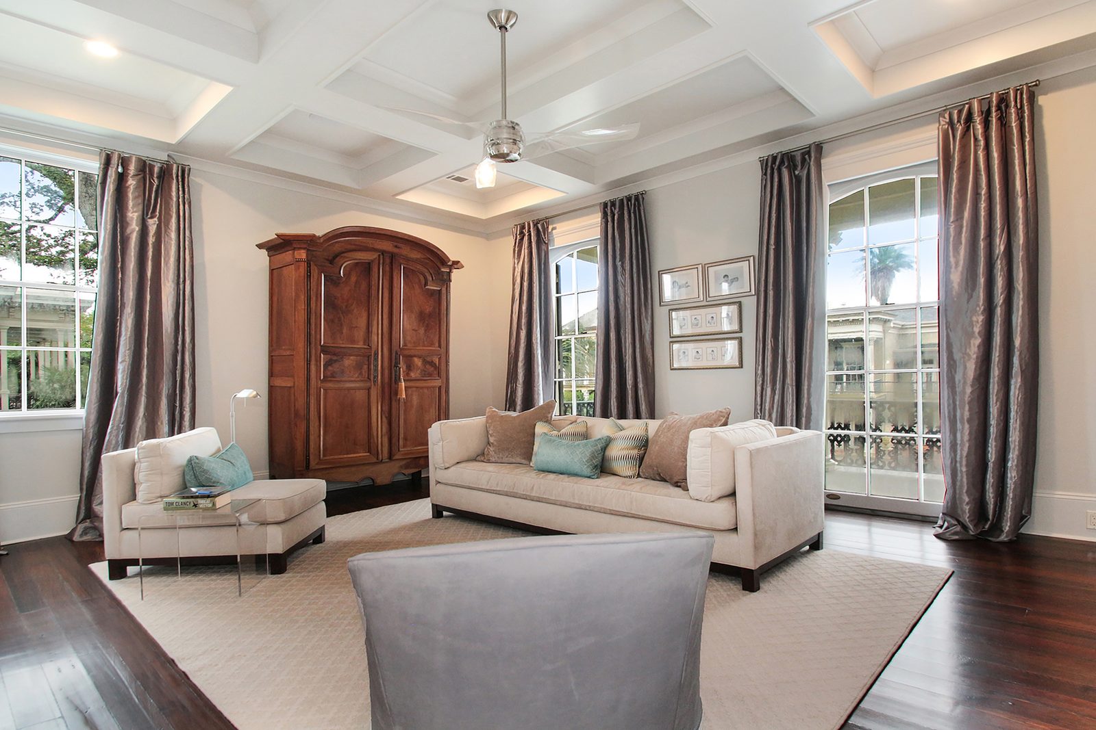 Living room with restored coffered ceiling after renovation