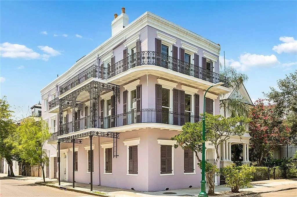Cast-iron galleries on three levels — Esplanade Avenue, French Quarter, renovated by DuCar Construction